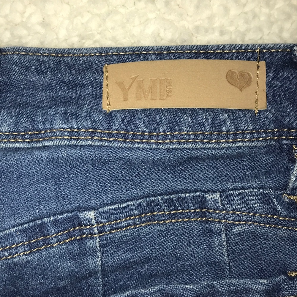 YMI midrise size 7 faded skinny jeans